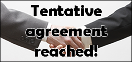 "Tentative agreement reached!" over hands shaking.