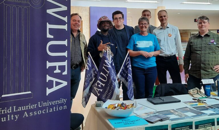 A Photo of WLUFA Executives with Students for Fair Employment Week